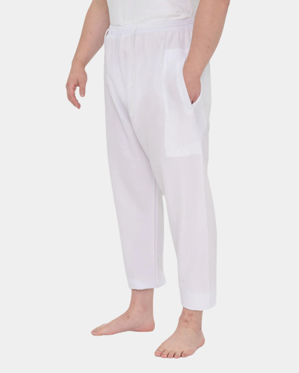 Pantalon blanc de qamis, détail poche et cordon de serrage